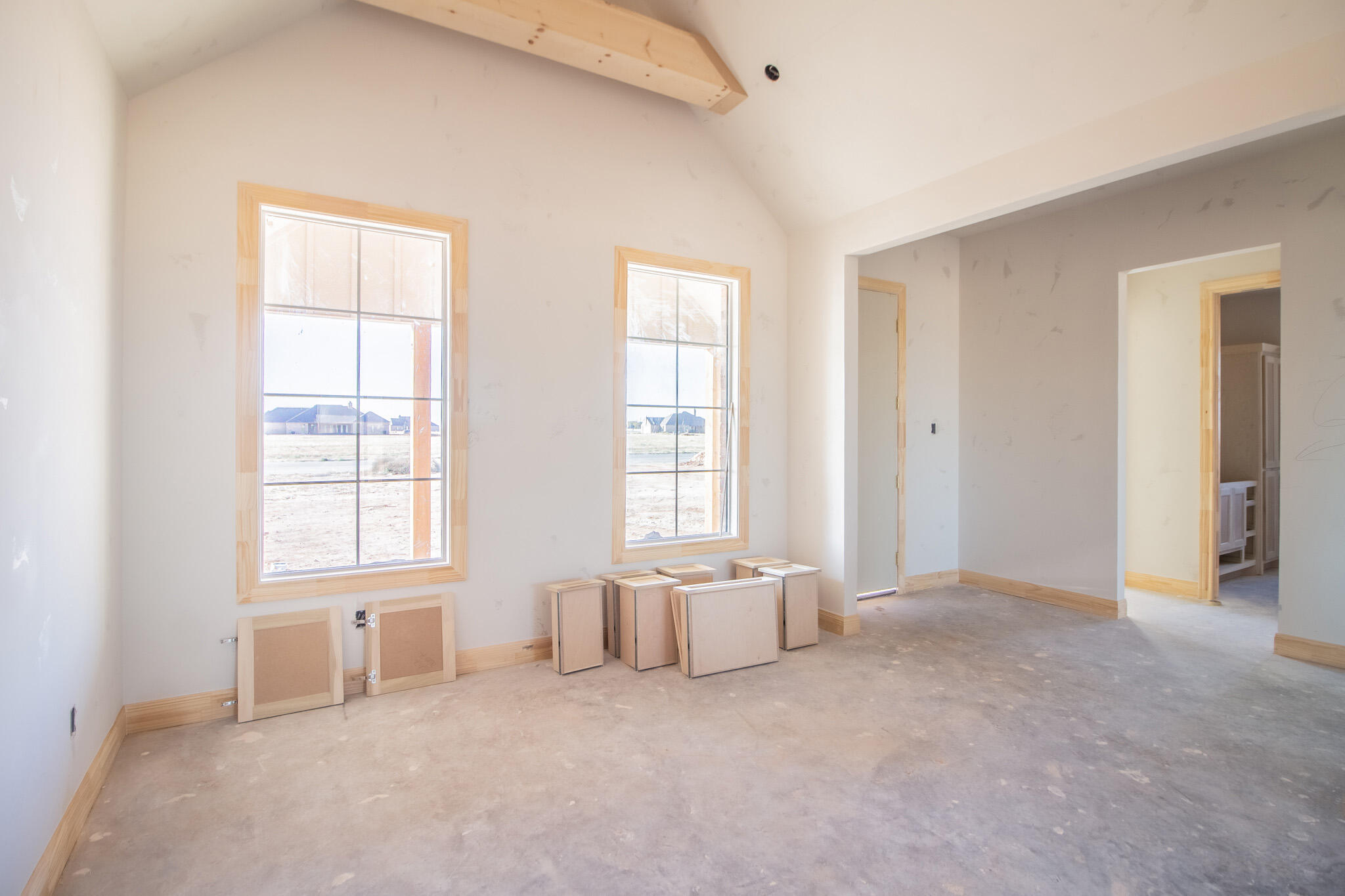309 Juniper New Home, TX 79381 - Photo 6 of 24 an empty room with windows and closet