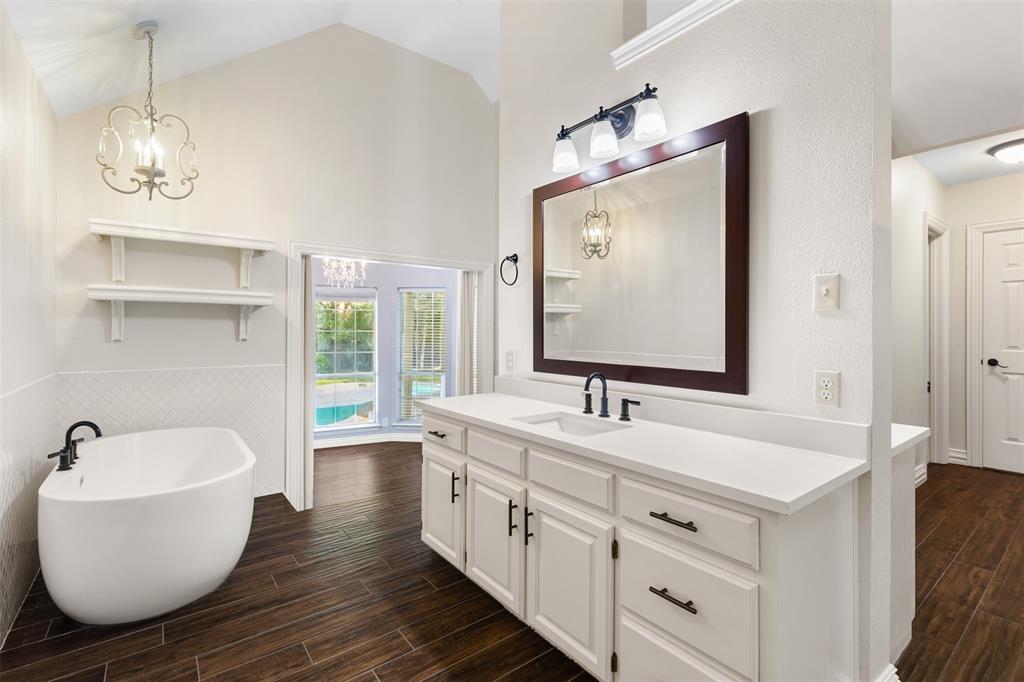 609 Seville Road Denton, TX 76205 - Photo 24 of 40 Soaking tub, separate vanities, 2 walk-in closets, tons of storage.