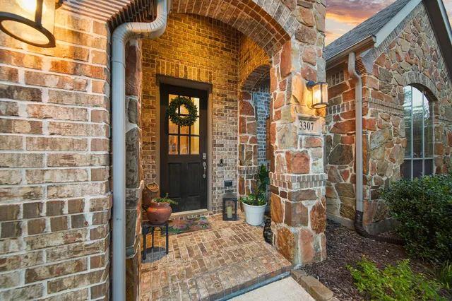 a view of a door with a bench