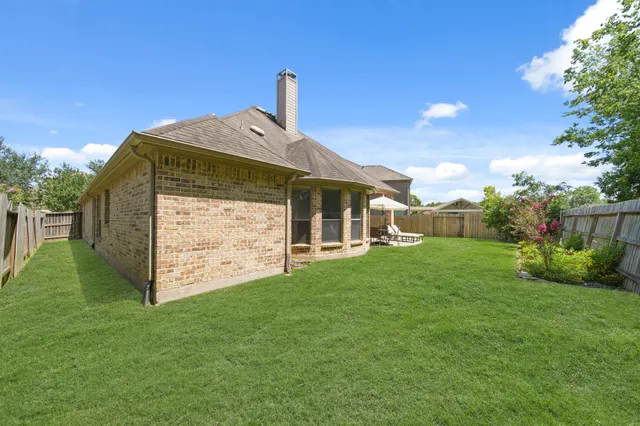 a front view of house with yard