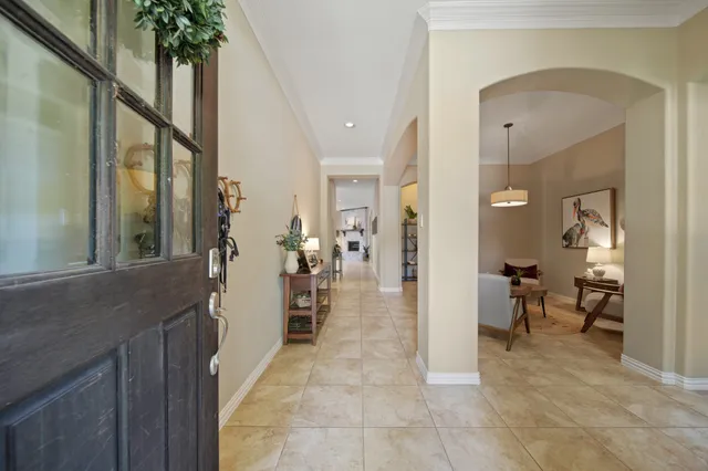a view of a hallway view with living room