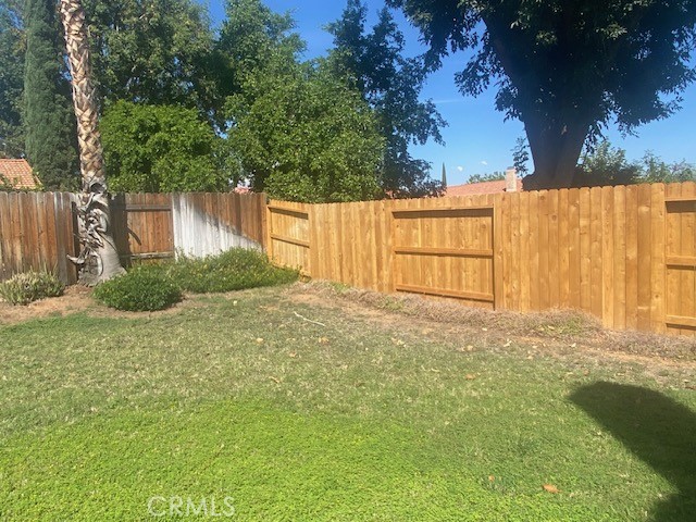 140 Channing Street Redlands, CA 92373 - Photo 30 of 32 Back yard side newer fence