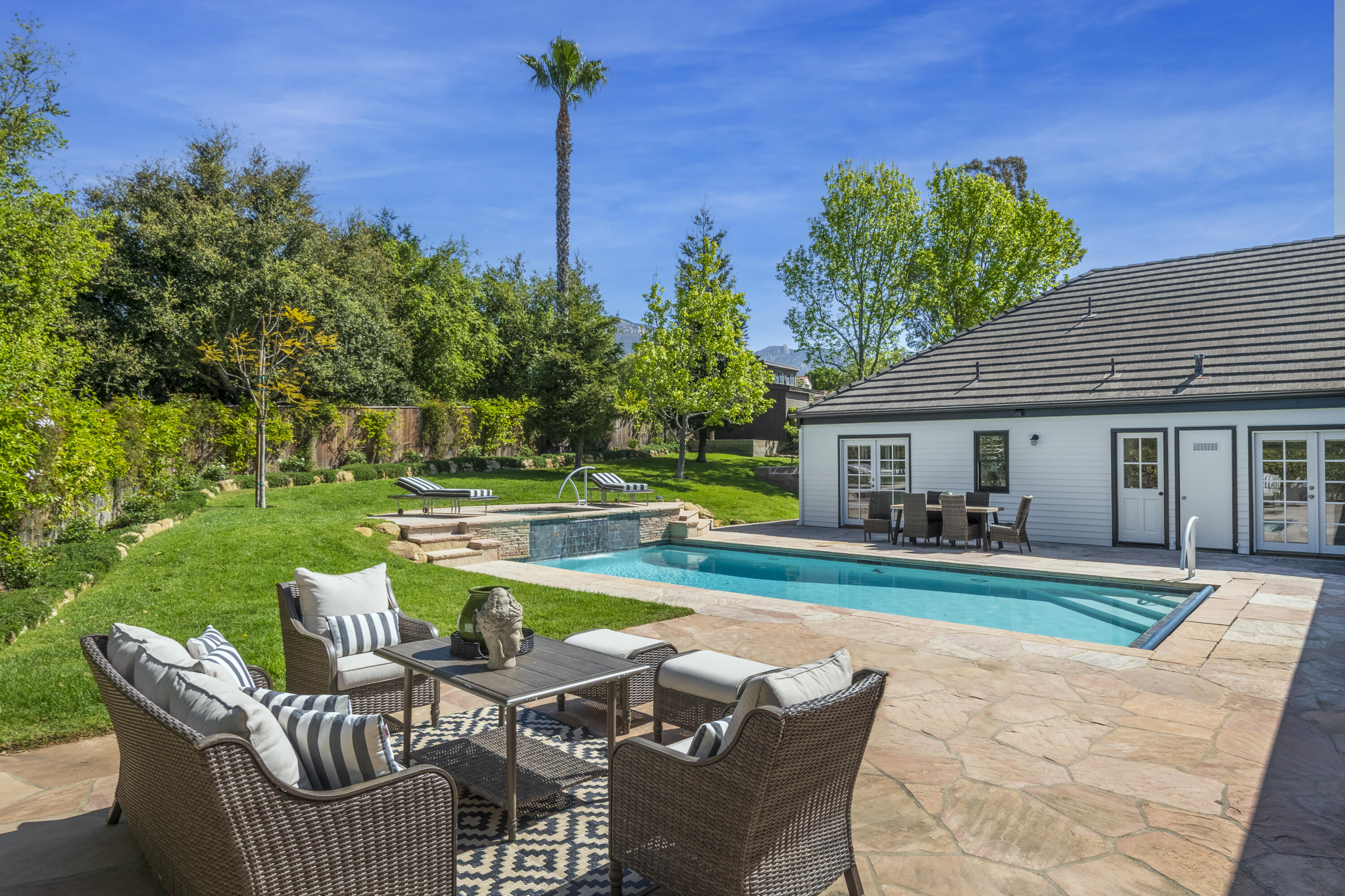 4530 Via Clarice Santa Barbara, CA 93111 - Photo 3 of 28 a view of a house with a yard and furniture