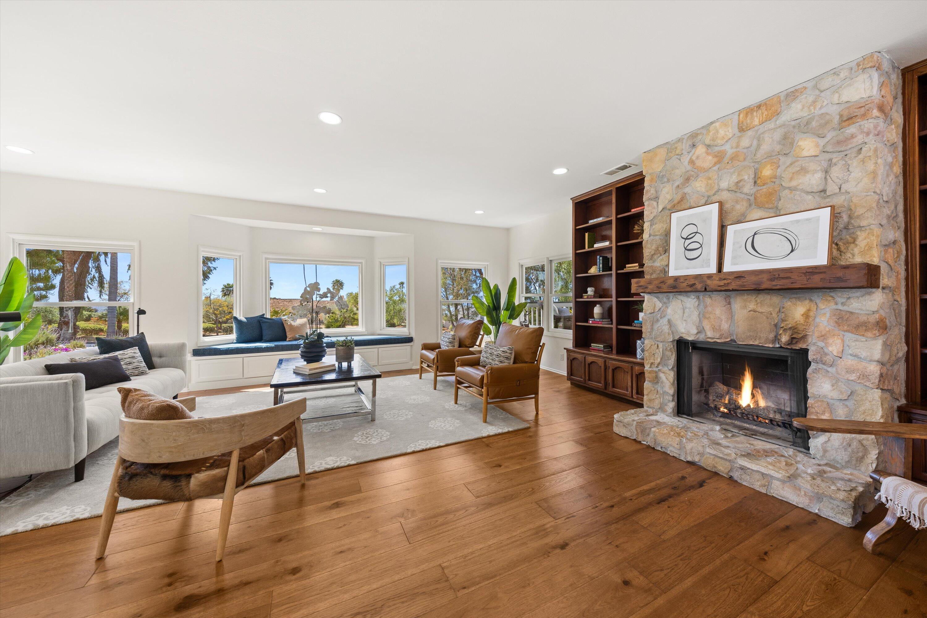 4530 Via Clarice Santa Barbara, CA 93111 - Photo 9 of 28 a living room with furniture and a fireplace