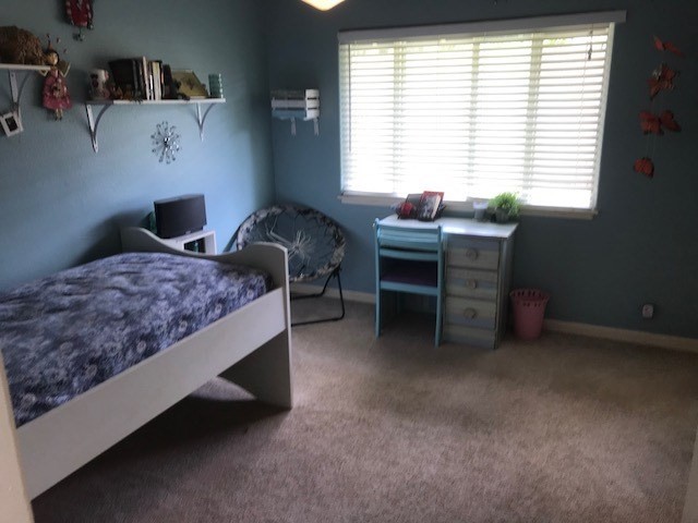 6050 Kapahi Road, Unit B Kapaa, HI 96746 - Photo 11 of 29 a bedroom with a bed and a window