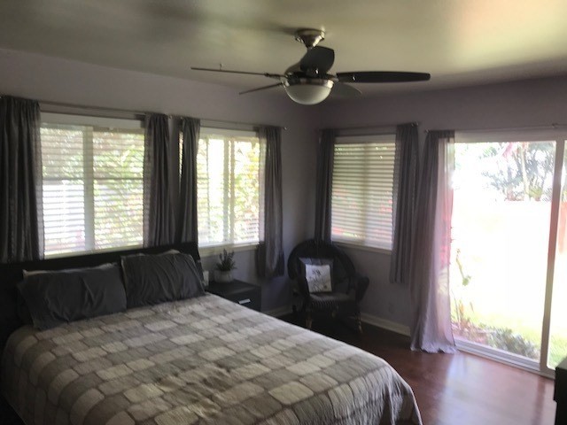 6050 Kapahi Road, Unit B Kapaa, HI 96746 - Photo 13 of 29 a bedroom with a bed and a window