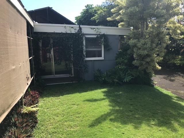 6050 Kapahi Road, Unit B Kapaa, HI 96746 - Photo 14 of 29 a view of a back yard of the house