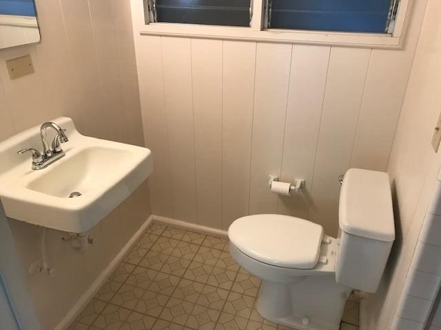 6050 Kapahi Road, Unit B Kapaa, HI 96746 - Photo 19 of 29 a bathroom with a sink a toilet and a mirror