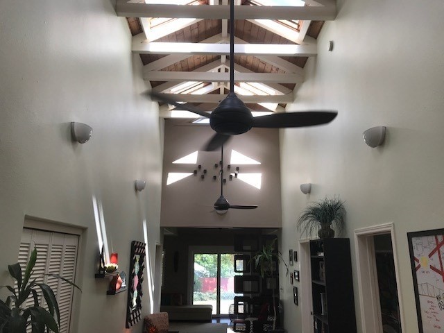 6050 Kapahi Road, Unit B Kapaa, HI 96746 - Photo 2 of 29 a view of a hallway with chandelier