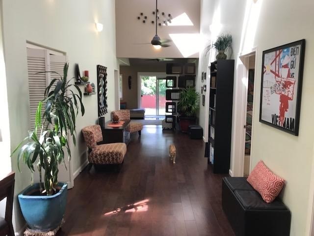 6050 Kapahi Road, Unit B Kapaa, HI 96746 - Photo 6 of 29 a living room with furniture and a potted plant