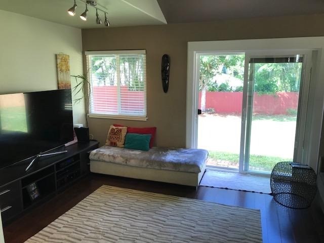 6050 Kapahi Road, Unit B Kapaa, HI 96746 - Photo 8 of 29 a bedroom with a bed and large window