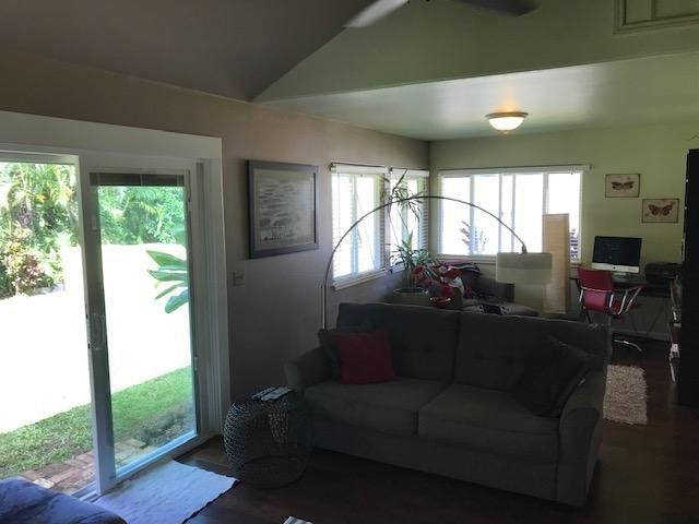 6050 Kapahi Road, Unit B Kapaa, HI 96746 - Photo 9 of 29 a living room with furniture and a large window