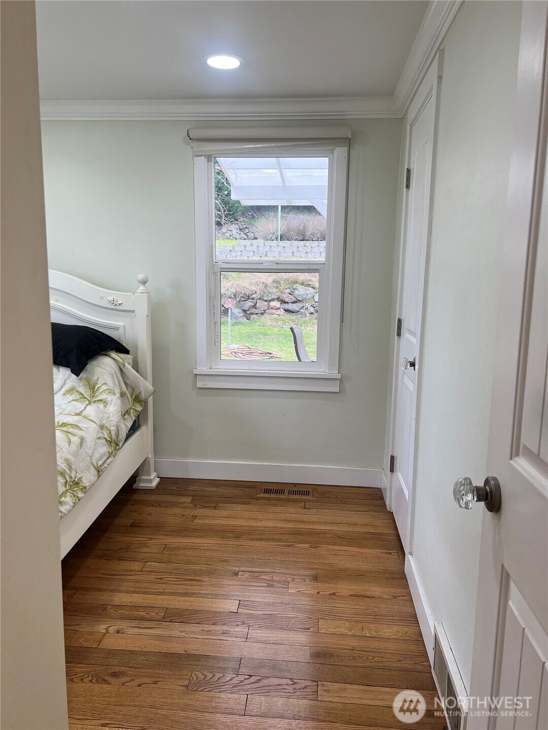 558 Windsor Place Northeast Renton, WA 98056 - Photo 17 of 20 a view of a room that has a bed in it