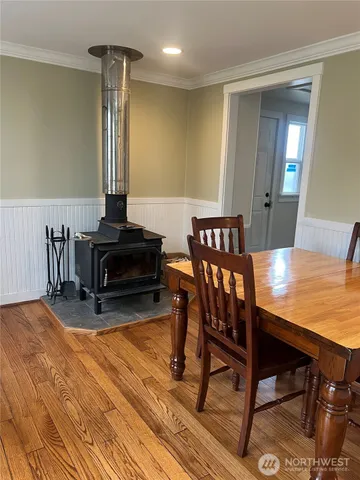 a view of a livingroom with furniture and a table