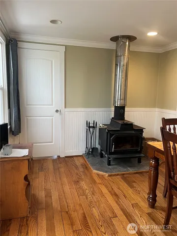 a living room with a furniture and a table