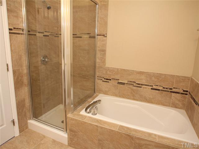 401 Scotts Ridge Trail Apex, NC 27502 - Photo 11 of 24 Tub & Separate Shower Shower is bigger than Pic