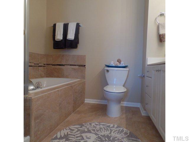 401 Scotts Ridge Trail Apex, NC 27502 - Photo 9 of 24 New Master Bath Tile