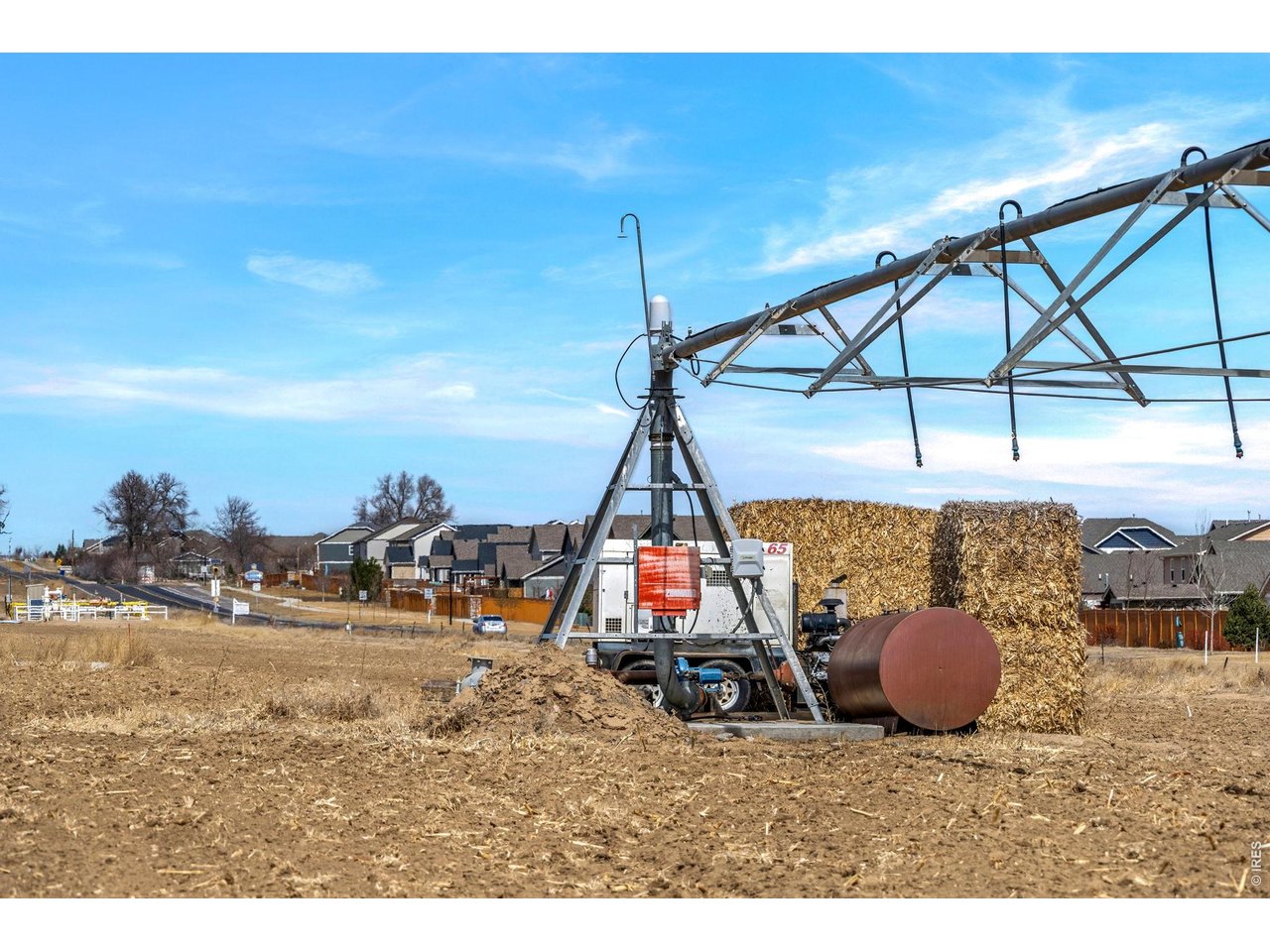 70 County Road Windsor, CO 80550 - Photo 11 of 15 a backyard of a house with table and chairs