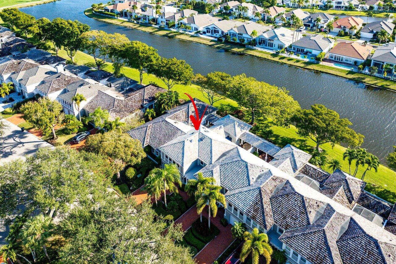 5696 Northwest 39th Avenue Boca Raton, FL 33496 - Photo 23 of 24 an aerial view of residential houses with outdoor space and lake view