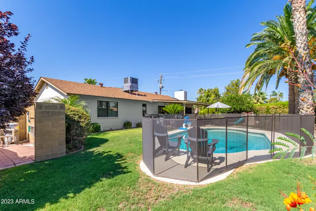 a view of a backyard with a patio