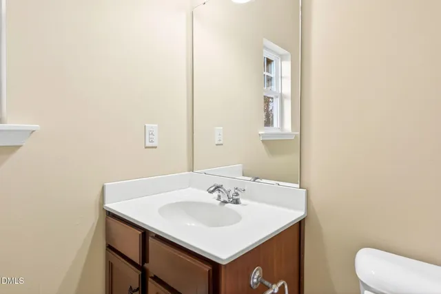 a bathroom with a sink and a toilet