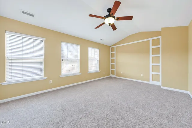 a view of a livingroom with a ceiling fan
