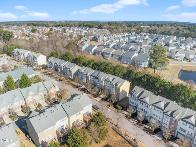 a view of a city with an ocean view