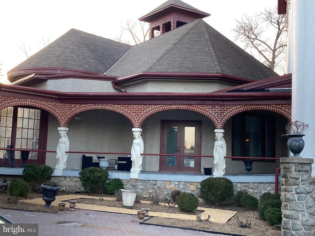 9610 Dewitt Drive, Unit B105 Silver Spring, MD 20910 - Photo 27 of 30 Porch of the Maidens