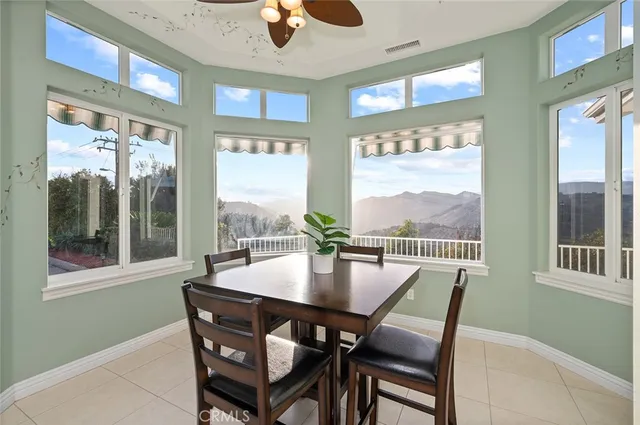 a view of a balcony with wooden fence