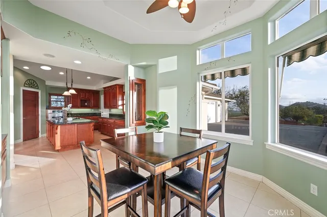 a view of livingroom with hardwood floor and a ceiling fan