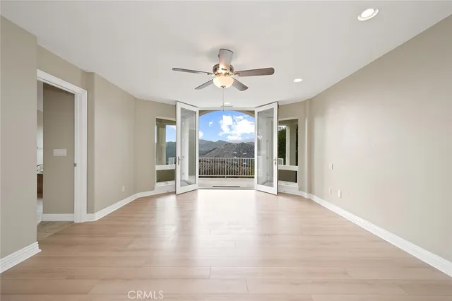 a bathroom with a shower a toilet and a sink