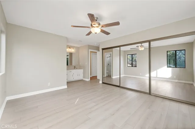 a view of a ceiling fan in a room