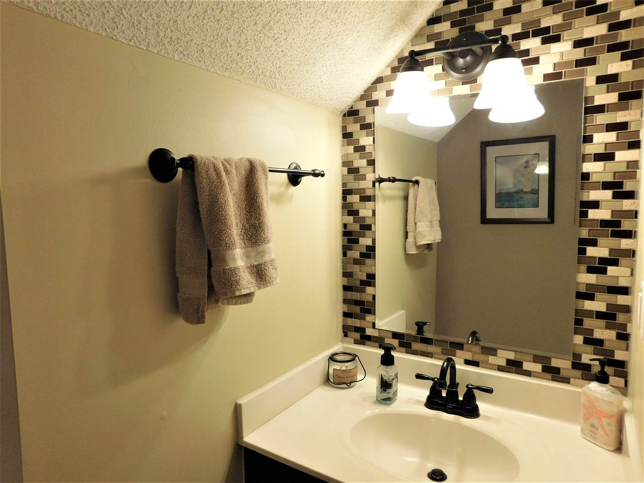 9420 Dawnshire Road Raleigh, NC 27615 - Photo 19 of 30 The Half Bath Has Custom Decorative Accents! Bath