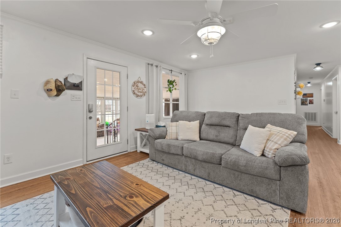 2060 Wade-Stedman Road Stedman, NC 28391 - Photo 11 of 41 a living room with furniture a window and a table