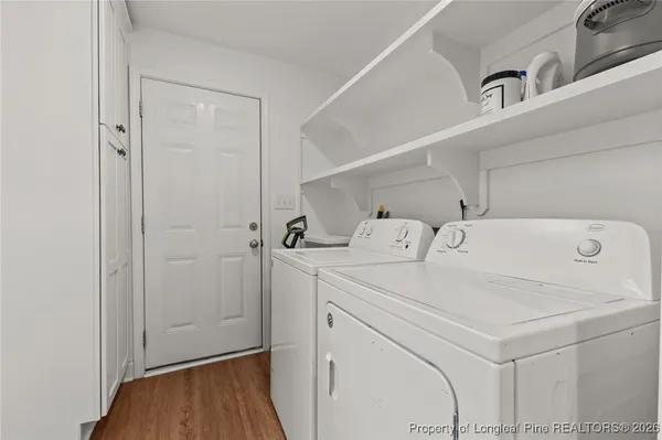 a utility room with dryer and washer