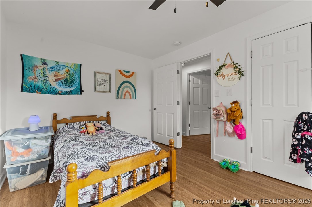 2060 Wade-Stedman Road Stedman, NC 28391 - Photo 21 of 41 a bedroom with a bed and a couch