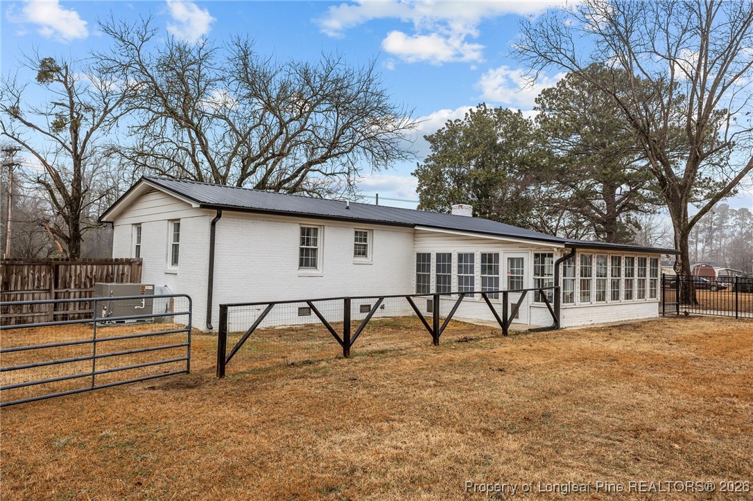 2060 Wade-Stedman Road Stedman, NC 28391 - Photo 29 of 41 a view of a house with backyard and a tree