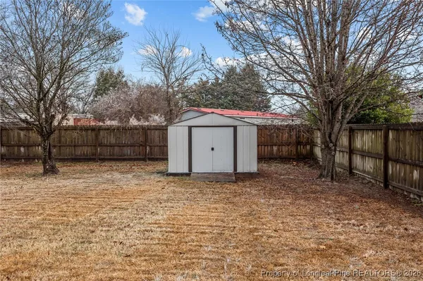 a house with trees in front of it