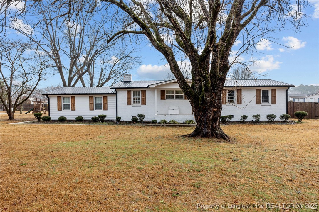 2060 Wade-Stedman Road Stedman, NC 28391 - Photo 3 of 41 a front view of a house with a yard