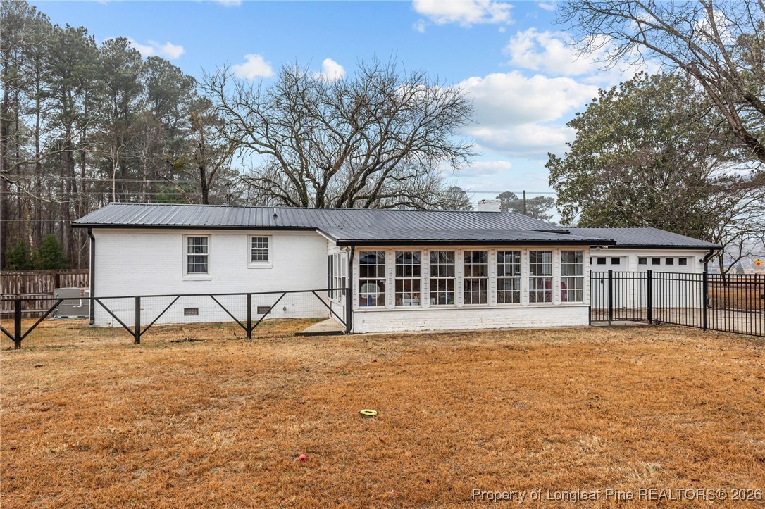 2060 Wade-Stedman Road Stedman, NC 28391 - Photo 32 of 41 a view of house with backyard and trees