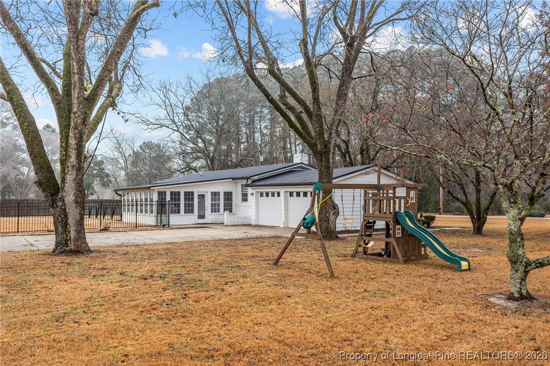 2060 Wade-Stedman Road Stedman, NC 28391 - Photo 36 of 41 a house view with a backyard space