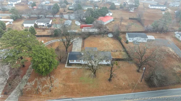 a vase of flowers sitting on top of a table