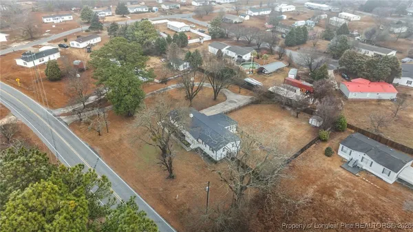 a view of balcony with yard
