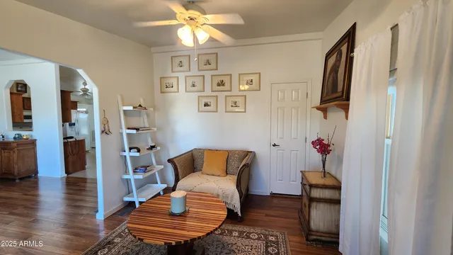 a living room with furniture and a window