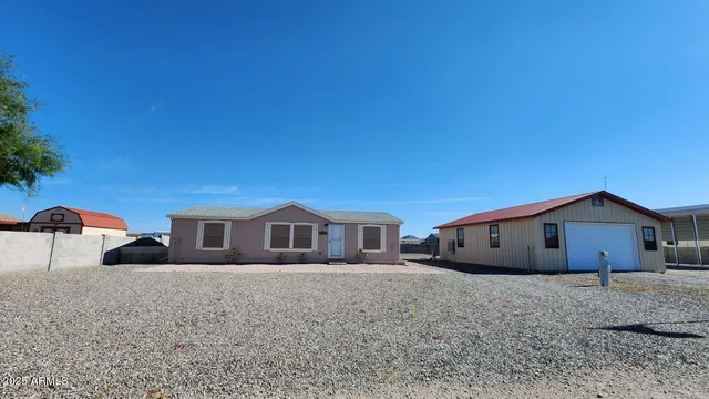 a house view with a backyard space