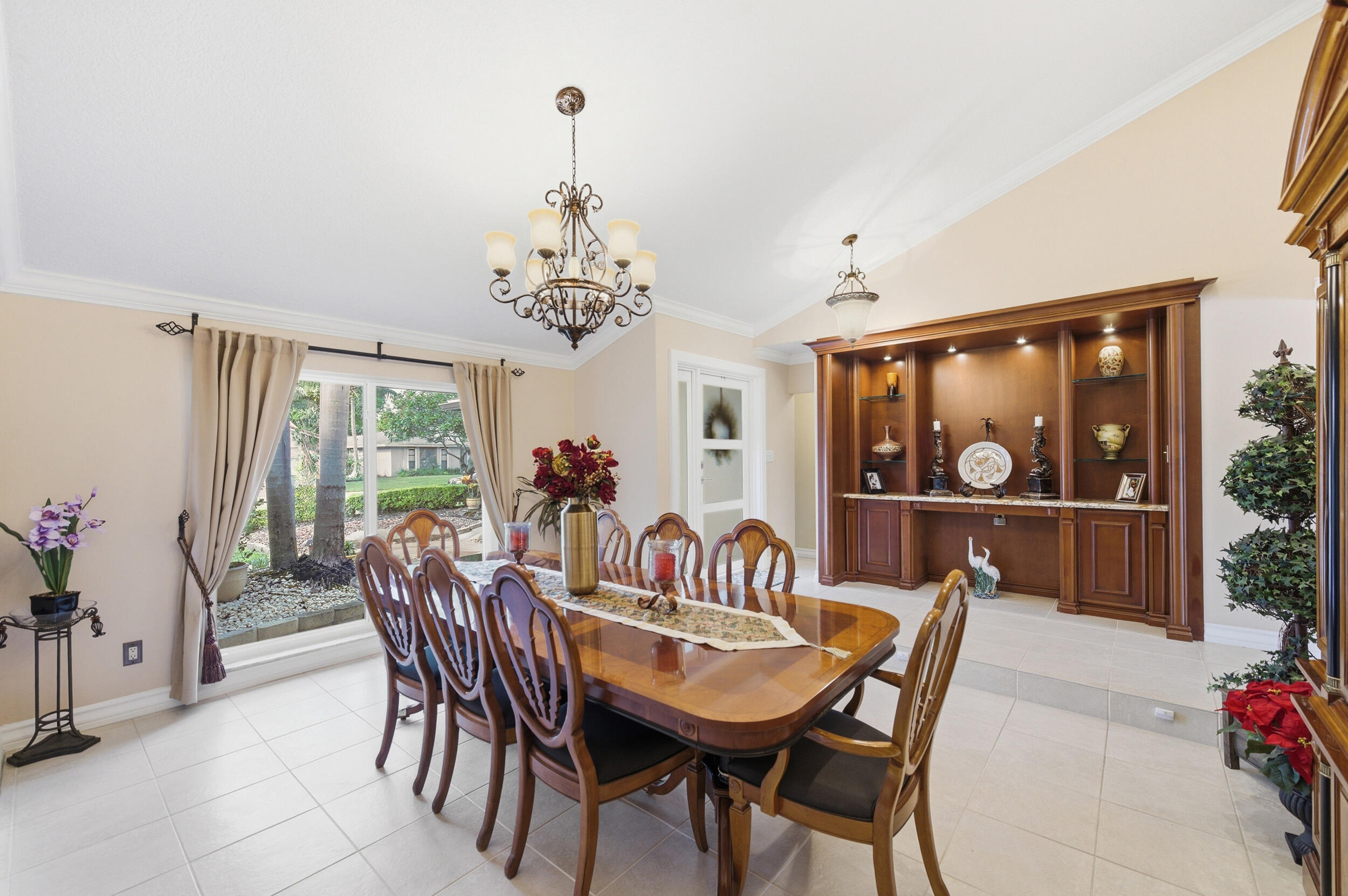 4780 Brandywine Drive Boca Raton, FL 33487 - Photo 10 of 43 a view of a dining room with furniture window and outside view