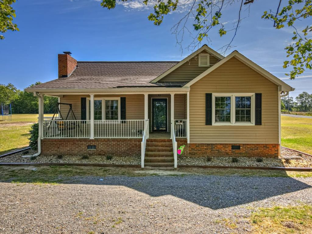 1673 Coleman Bridge Road Wagener, SC 29164 - Photo 1 of 45 a view of a house with a yard