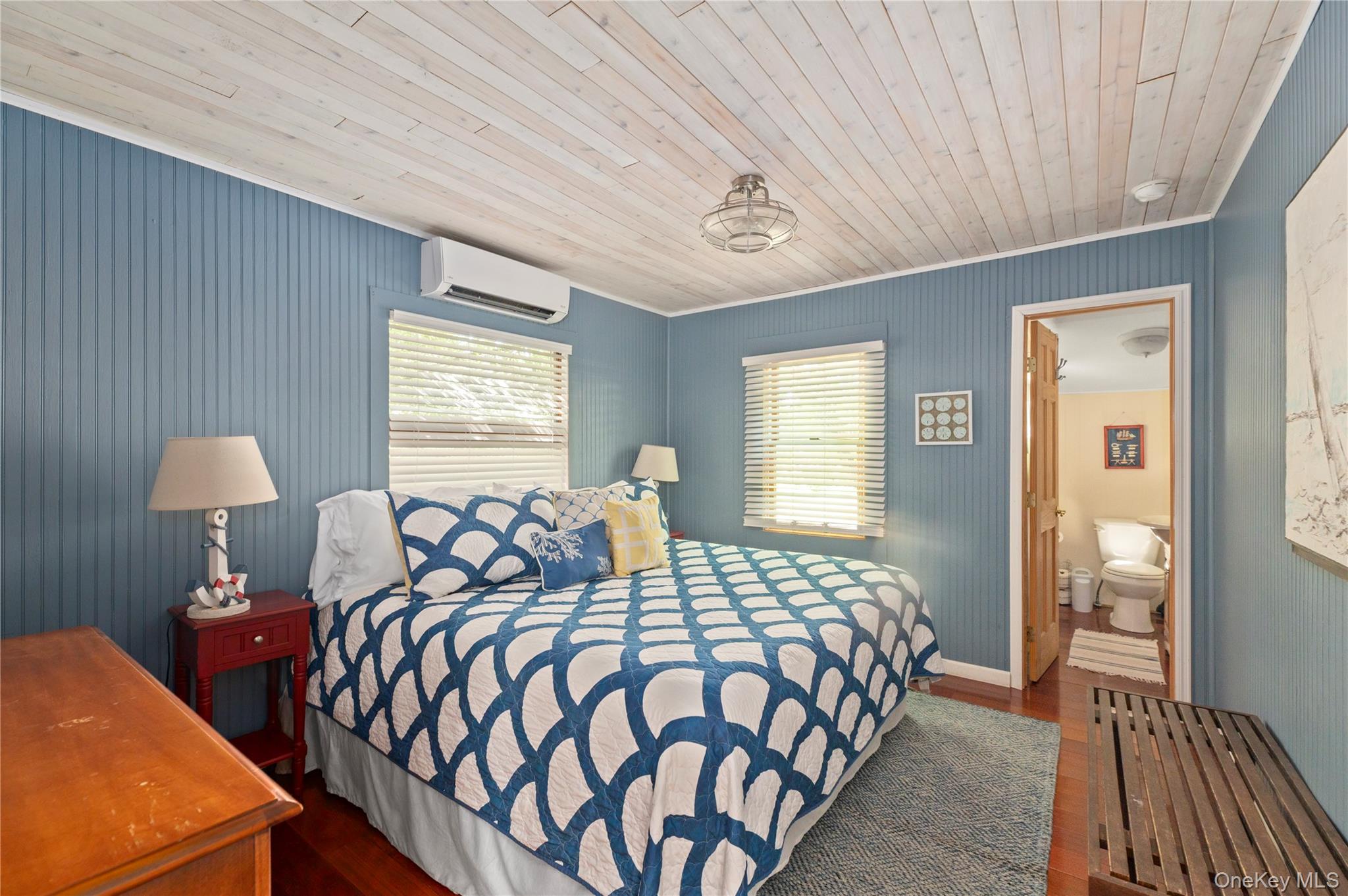 20 Seneca Walk Ocean Beach, NY 11770 - Photo 13 of 19 a bedroom with bed and window