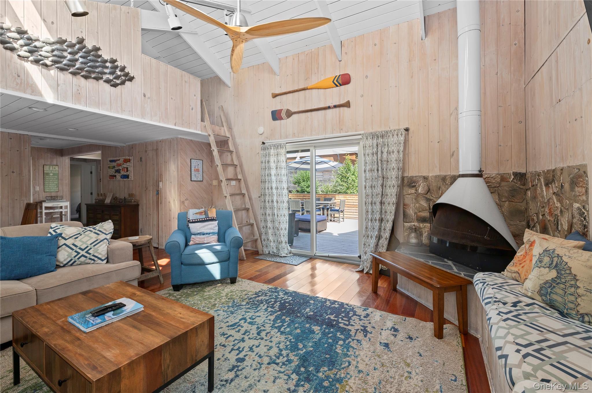 20 Seneca Walk Ocean Beach, NY 11770 - Photo 9 of 19 a living room with furniture and a window