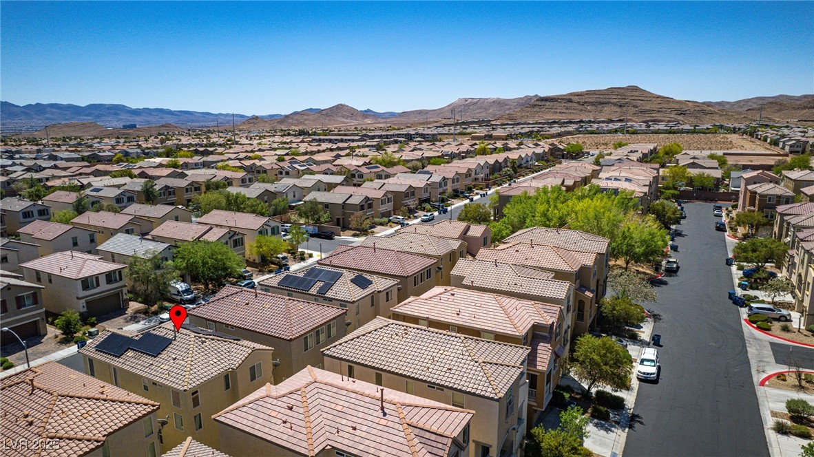 10519 Mann Street Las Vegas, NV 89141 - Photo 40 of 48 Aerial perspective of suburban area featuring mountains